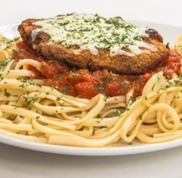 Chicken Parmesan over Spaghetti.